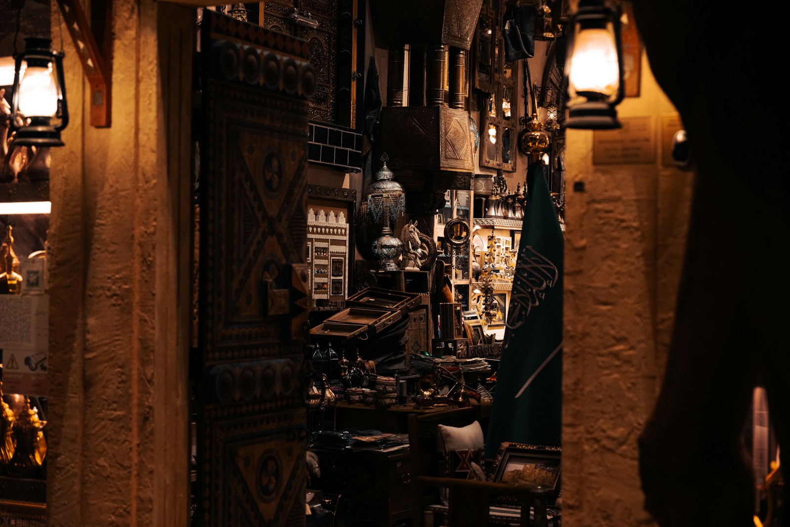 Ornate doorway leading to a cluttered shop interior store