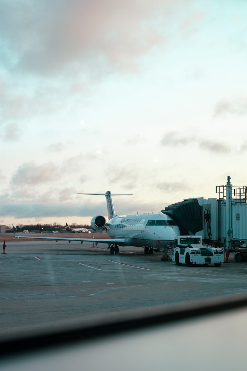 a large jetliner sitting on top of an airport tarmac