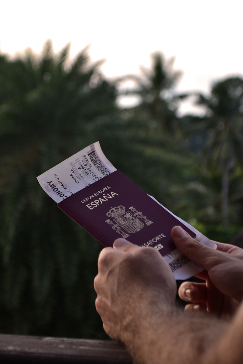 Spanish passport and ticket, ready for travel.